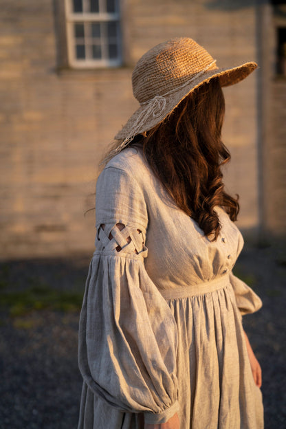 Meg March linen dress with puffy sleeves, with hat