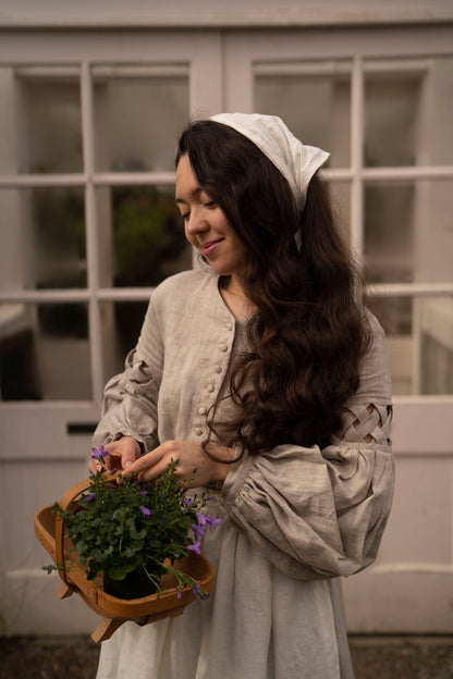 Meg March linen dress with puffy sleeves, with white headscarf