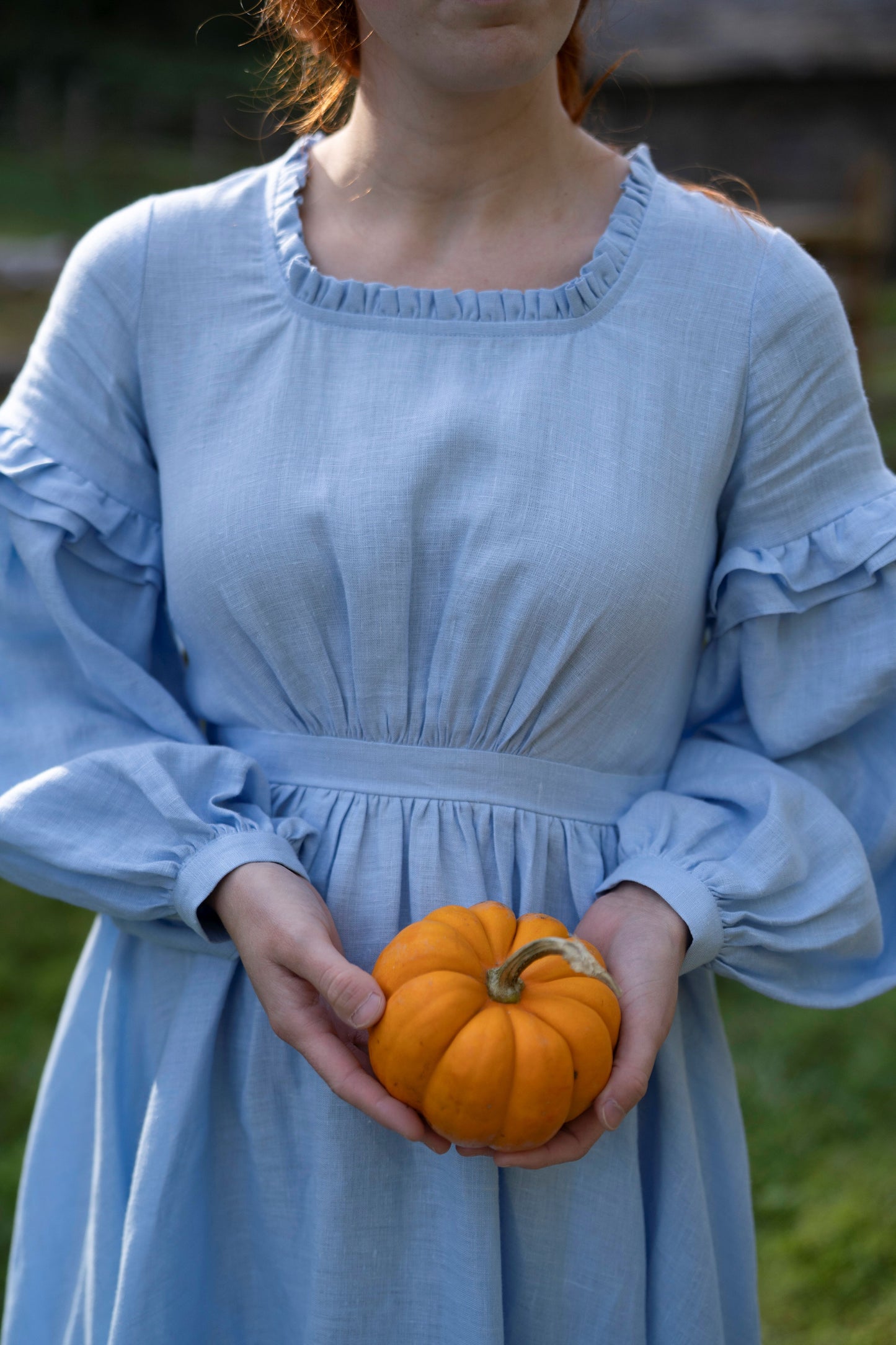 Ella Linen Dress in sky blue. 
- Fabric: 100% medium weight linen (190 g), Oeko-Tex Standard 100 certified
- Ruffled neckline
- Puffed sleeves
- Flared skirt
- Rear zip fastening
- Lacing on the back
- 2 side seam pockets
- Midi length
October harvest