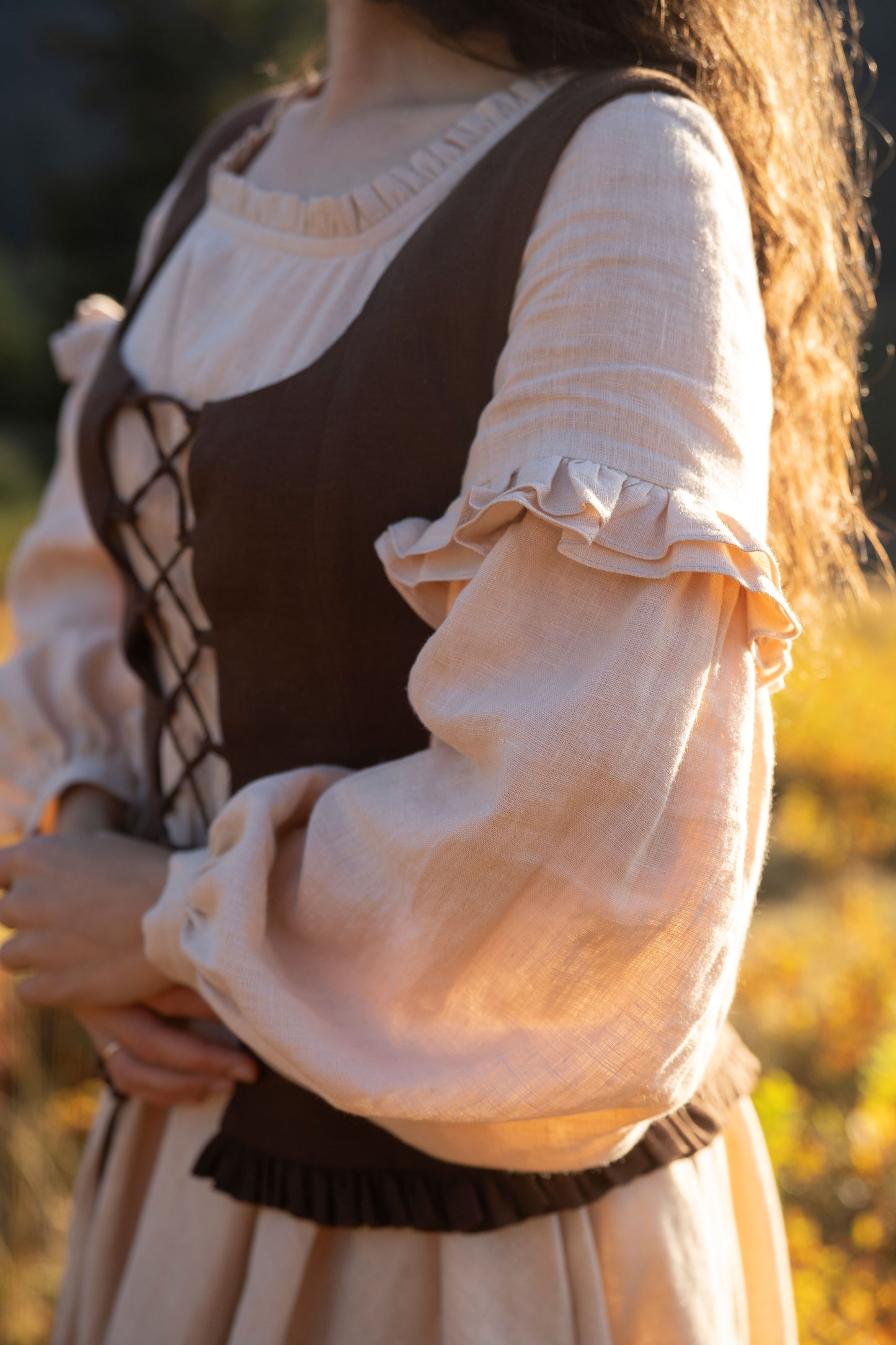 Ella linen dress with long sleeves in beige color for ladies. Collaboration collection of Little Women Atelier and Kayla Lobermeier and Jill Haupt of @underatinroof. Brand new linen clothes, linen vests, linen dresses, boustiers, chemise.