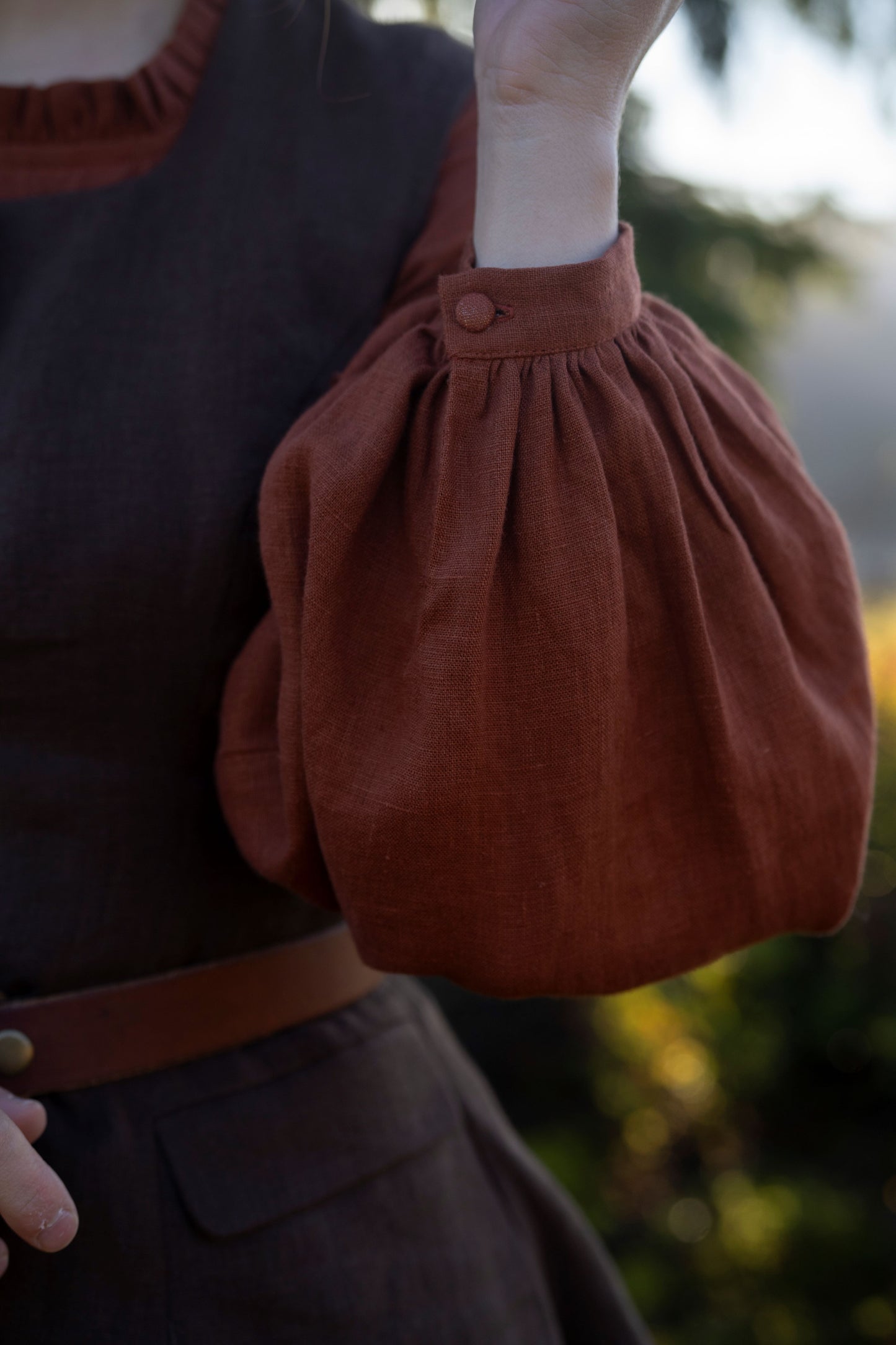 Ella linen dress with long puffed sleeves. 
Kayla Lobermeier and Jill Haupt of @underatinroof