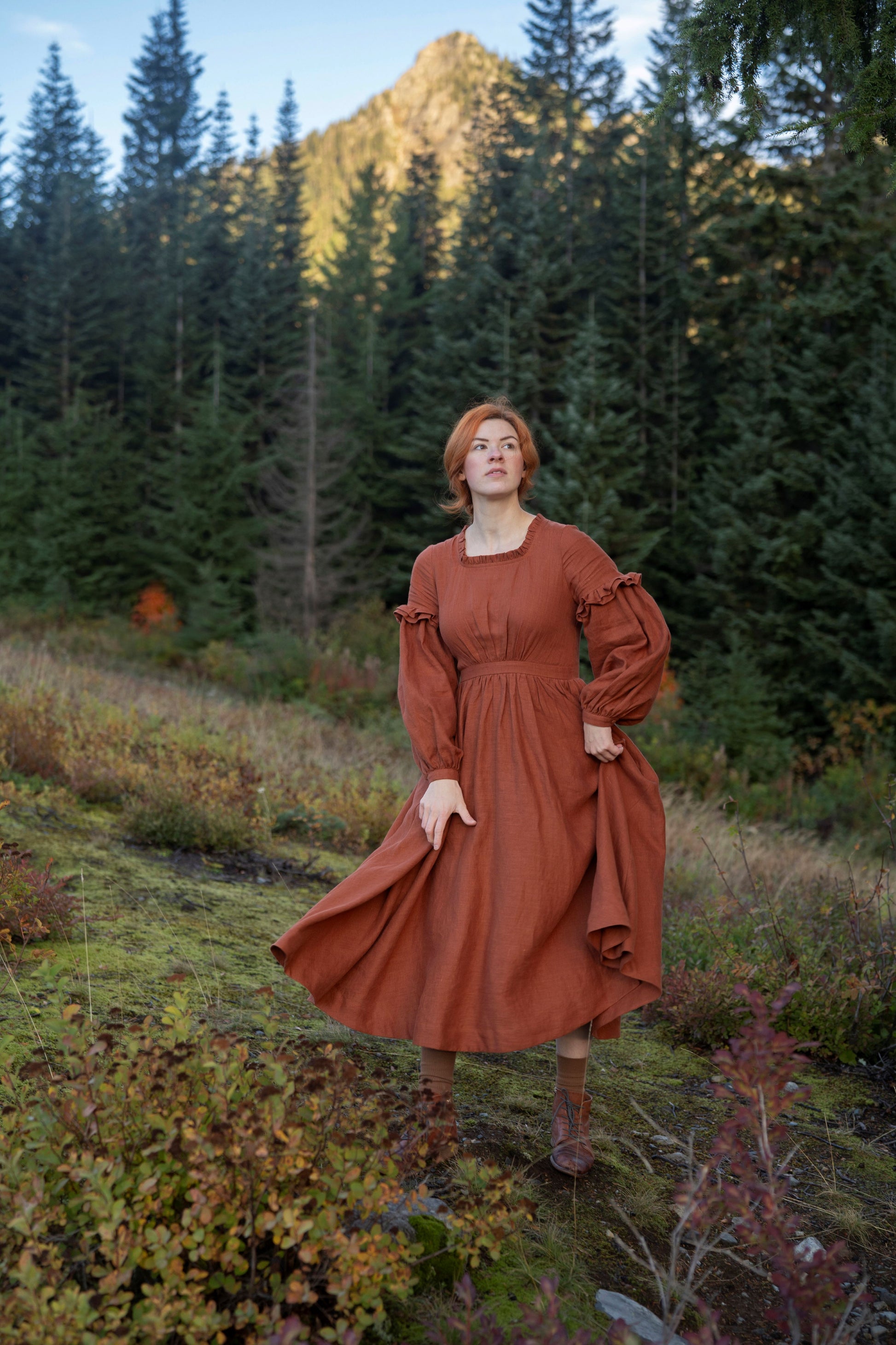 Ella linen dress in rust for women with long sleeves. New collection of Little Women Atelier and UnderATinRoof. New linen clothes, linen vests, boustiers, dresses, chemise.
