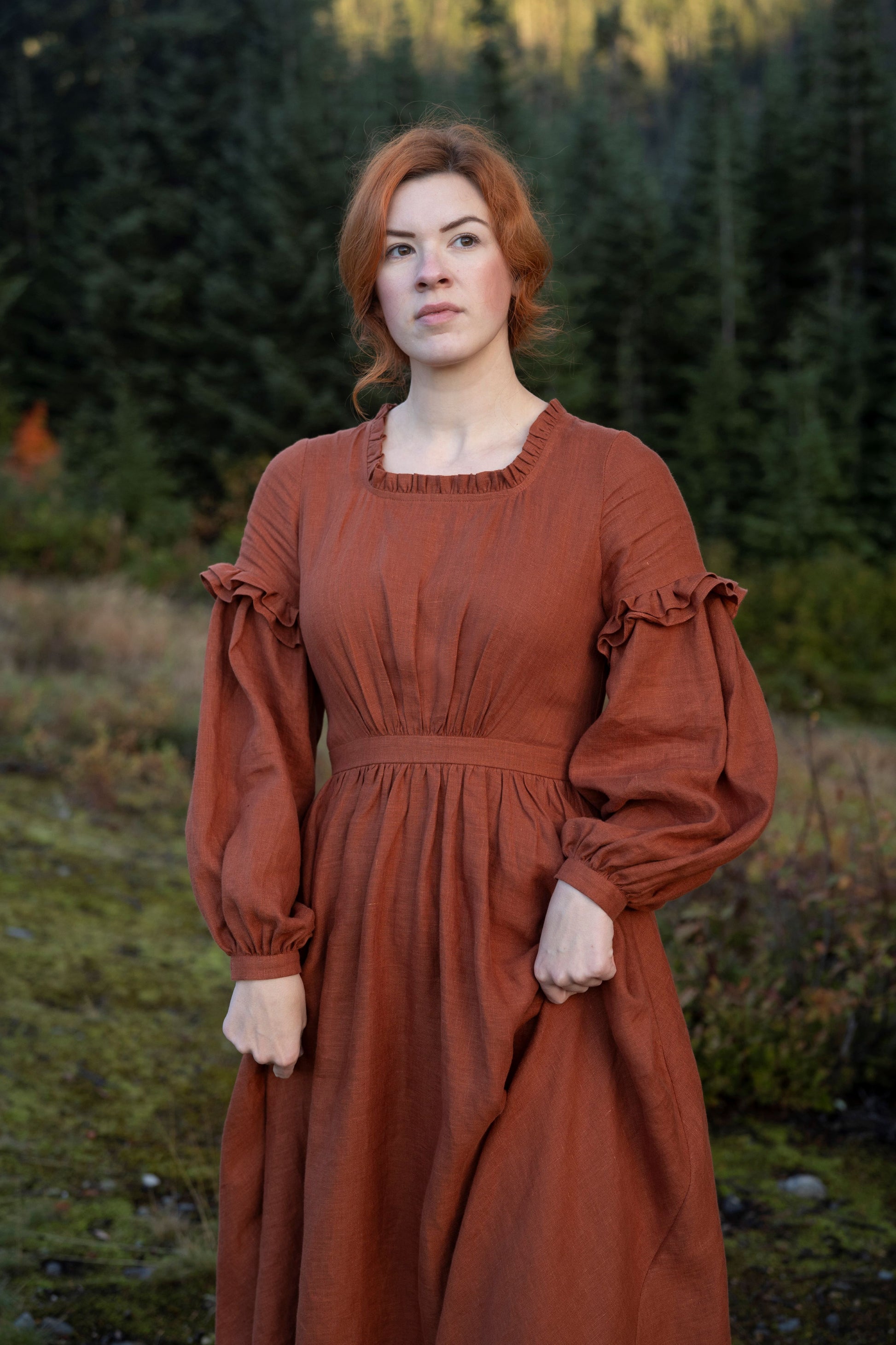 Ella linen dress in Rust
- Fabric: 100% medium weight linen (190 g), Oeko-Tex Standard 100 certified
- Ruffled neckline
- Puffed sleeves
- Flared skirt
- Rear zip fastening
- Lacing on the back
- 2 side seam pockets
- Midi length
Kayla Lobermeier and Jill Haupt of @underatinroof