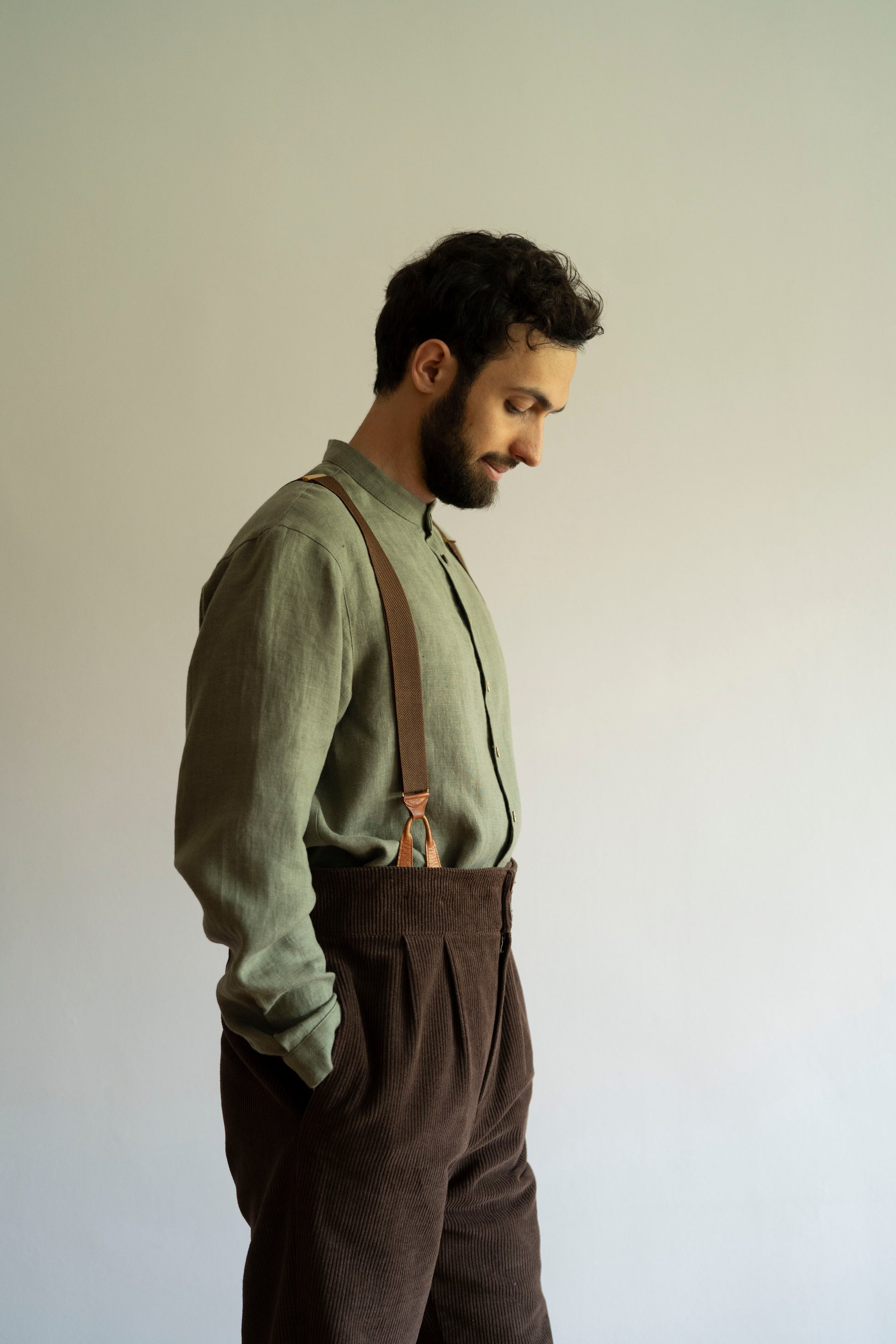 Men's linen shirt with mandarin collar in sage green. And velvet pants in chocolate. And vintage suspender.