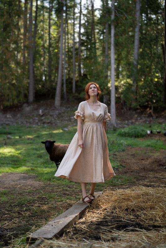 Odette Linen Dress in beige with short sleeves. A new collaboration of Little Women Atelier and Kayla Lobermeier and Jill Haupt of @underatinroof. Brand new linen clothes, linen vests, linen chemise, linen boustier.