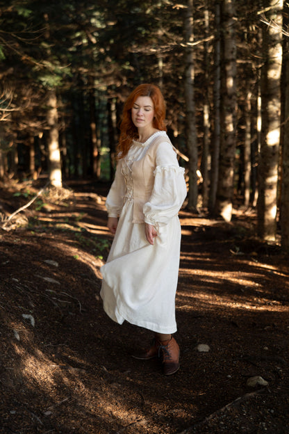 Faye linen bustier in beige and Ella linen dress with long sleeves.
• Cottagecore Fashion
 • Eco-Friendly Clothing
 • Handcrafted Fashion
 • Timeless Style